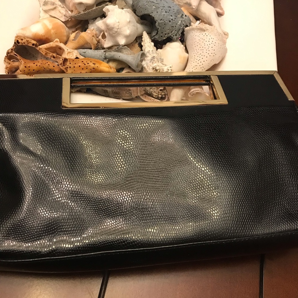 Joan rivers clutch bag